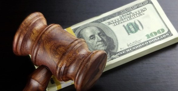 У Подільському районі дві жінки намагались підкупити слідчого  за 1 тис. доларів 