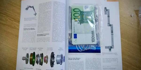 Київські митники знайшли у посилці з Німеччини каталог із сюрпризом   