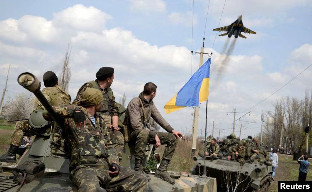 Українські захисники під час АТО. Фото: Reuters